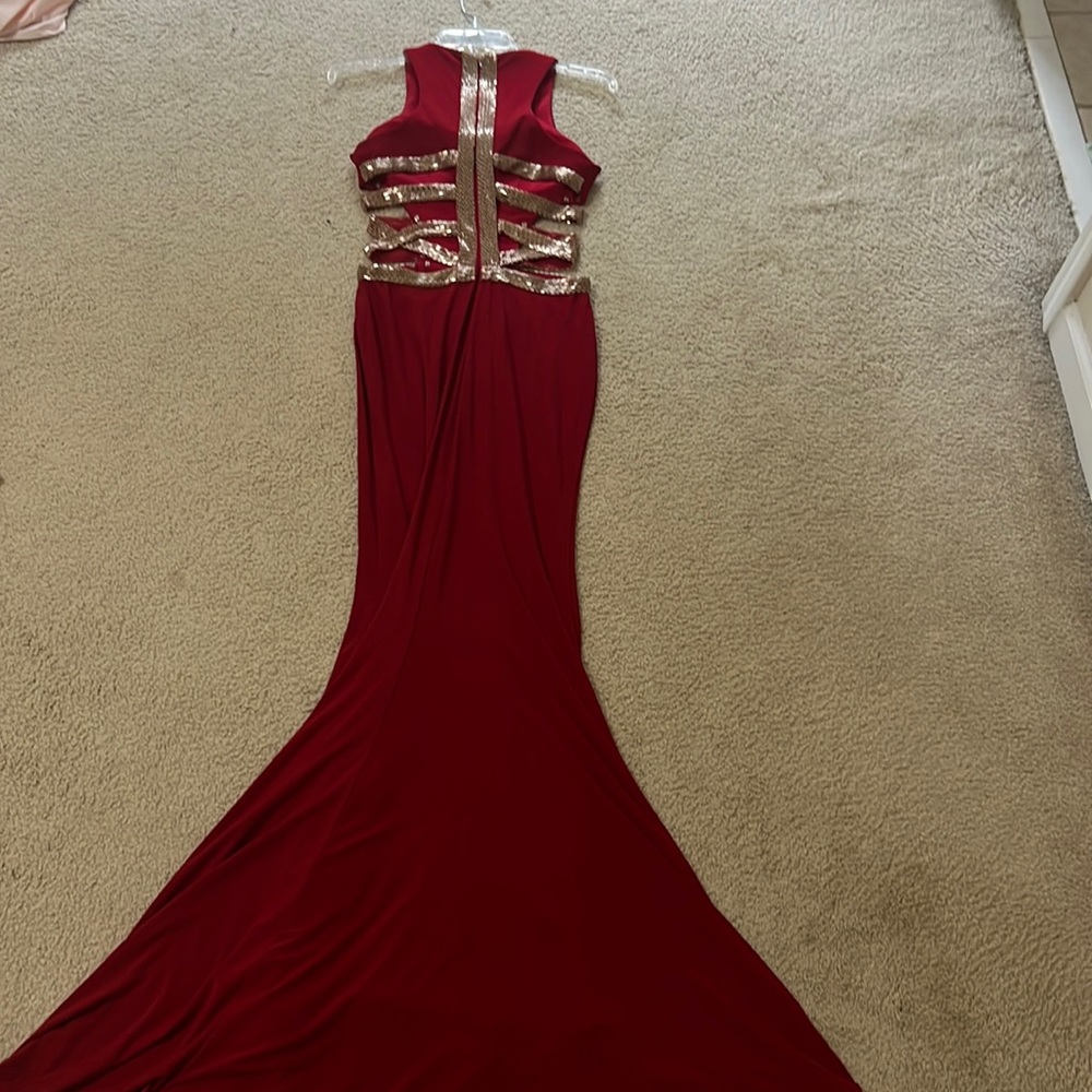 Faviana Red and gold accent gown size 0 perfect condition